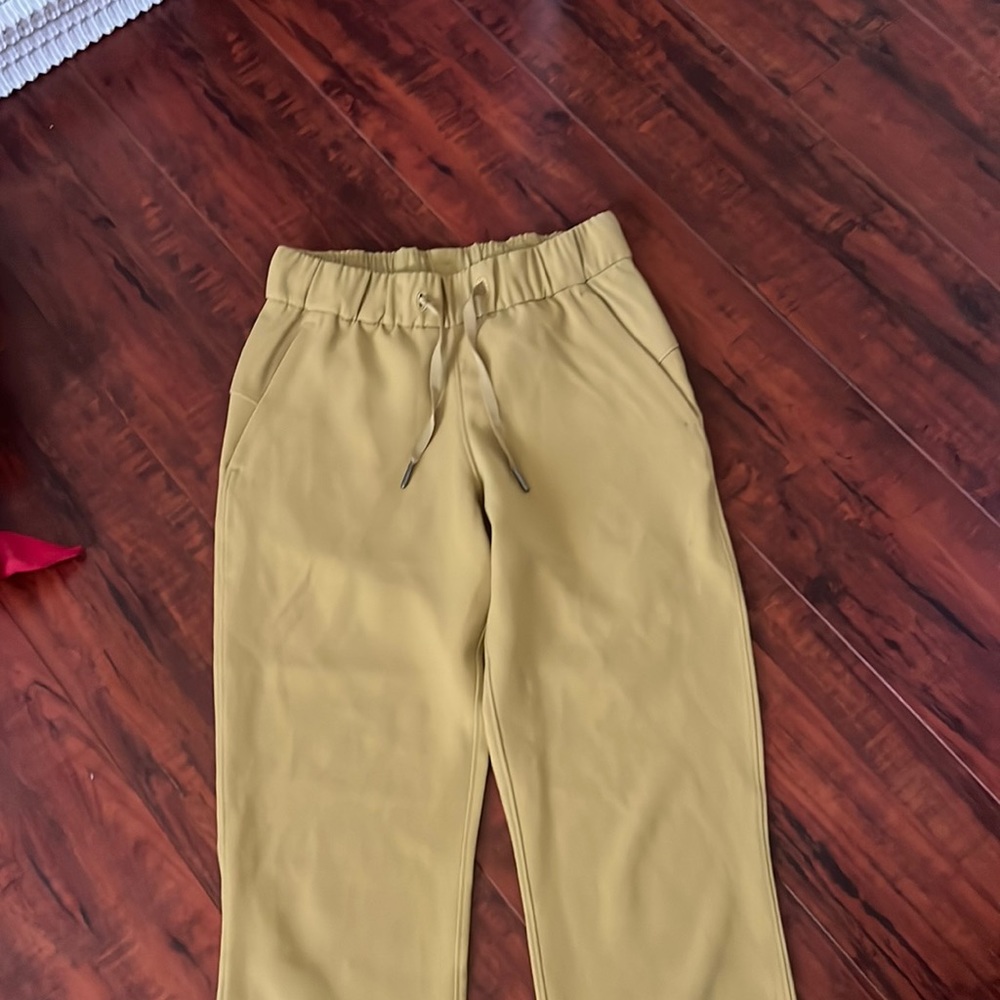 lulu lemon yellowish loose pants cropped